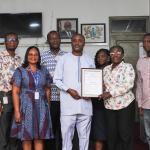 Picture: Prof. Gabriel Dwomoh, the Vice-Chancellor (middle), receives the accreditation plaque from Ms. Felicia Ofosuaa Tettey (2nd from right), alongside staff from the Counselling Directorate and other university officials.