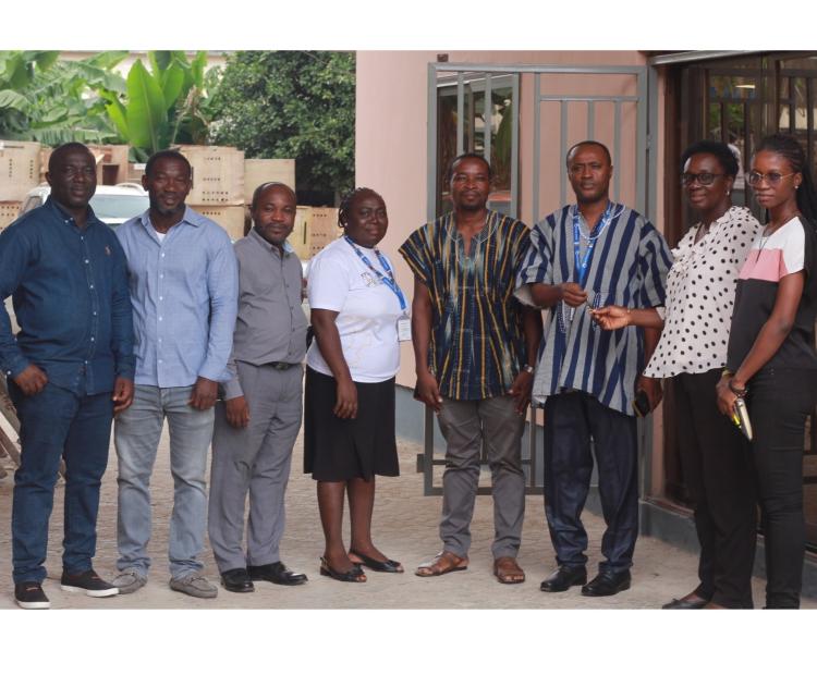 The Vice-Chancellor Prof. Gabriel Dwomoh (3rd from right) receiving the keys to the new Oil and Gas Engineering laboratory from Mrs. Nana Yaa Adusa-Poku, Deputy Director of the Works Directorate (2nd from right), alongside the dedicated team that brought the project to fruition.)