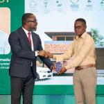 Emmanuel Amadu of Kumasi Technical University receiving the Bronze Award for his innovative design of a passive building during the 3rd IFC Green Building Competition in Accra, July 2024.