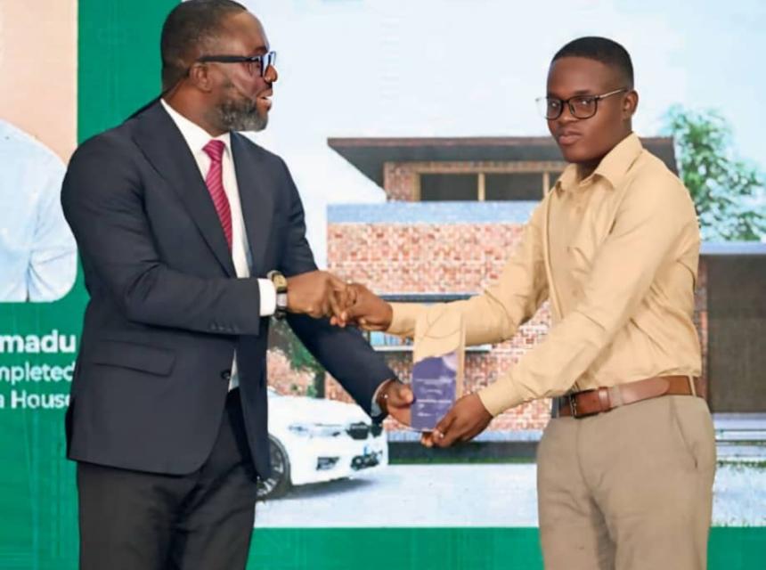 Emmanuel Amadu of Kumasi Technical University receiving the Bronze Award for his innovative design of a passive building during the 3rd IFC Green Building Competition in Accra, July 2024.